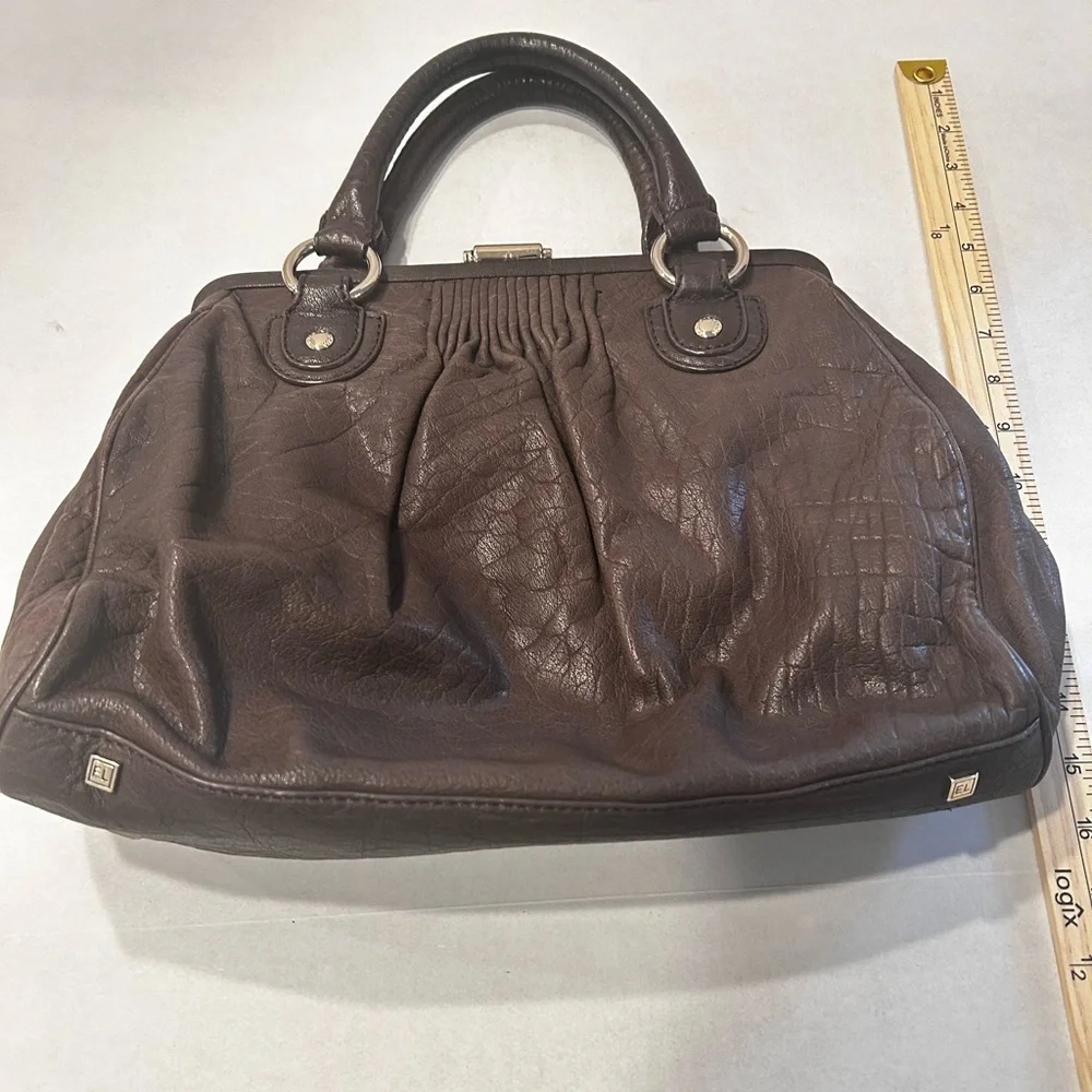 Elliott Lucca excellent used